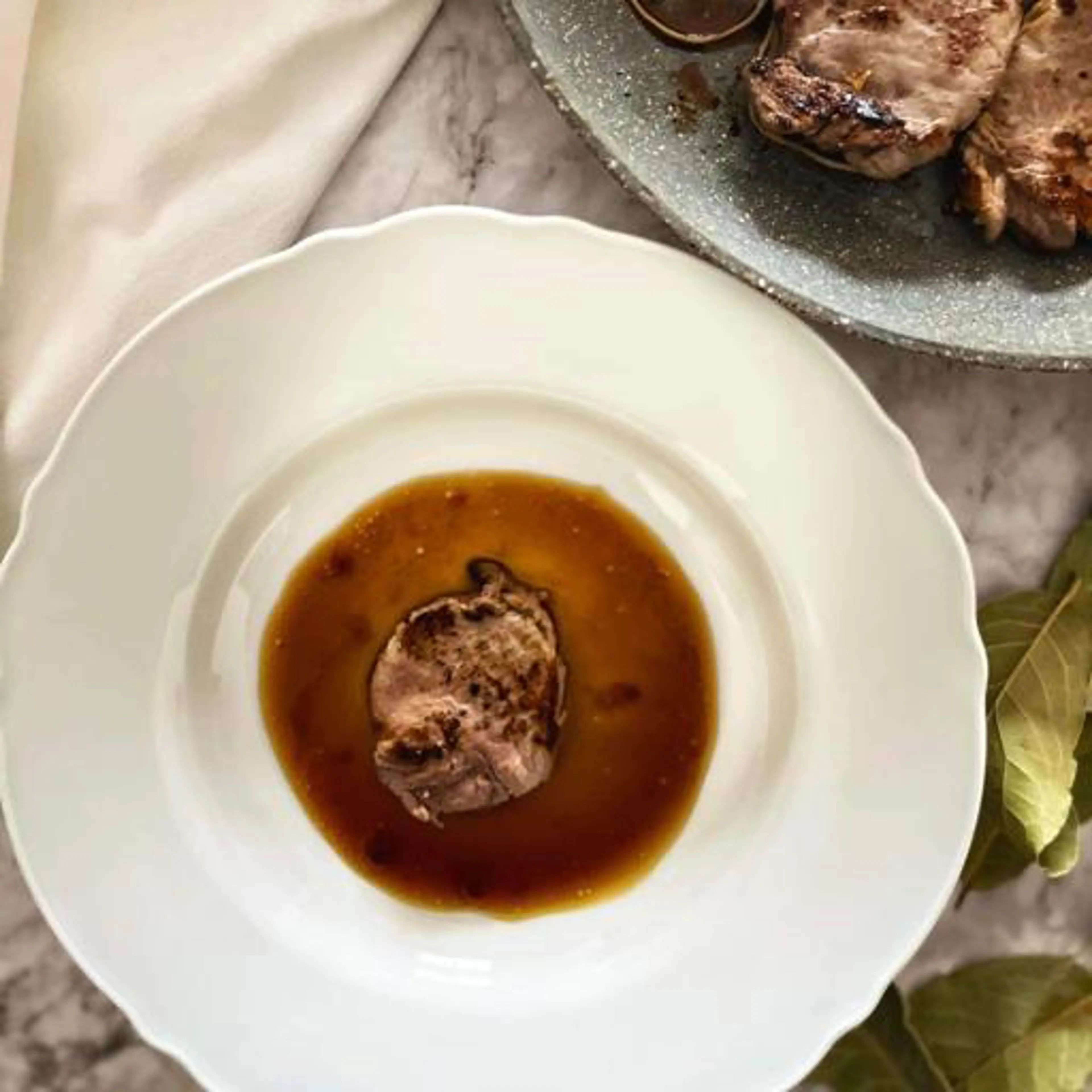 Beef medallions with coffee sauce