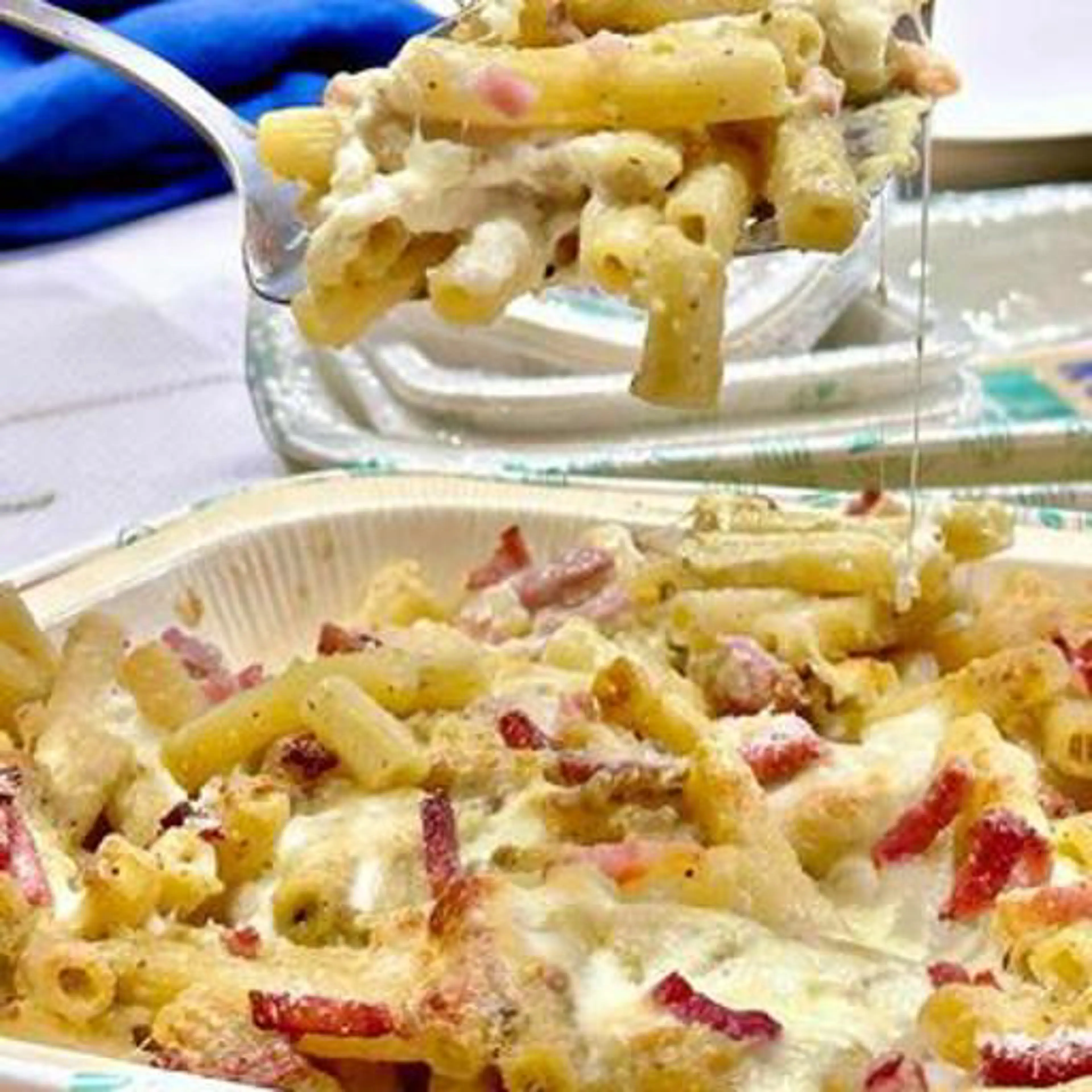 Baked pasta with stracciatella and speck