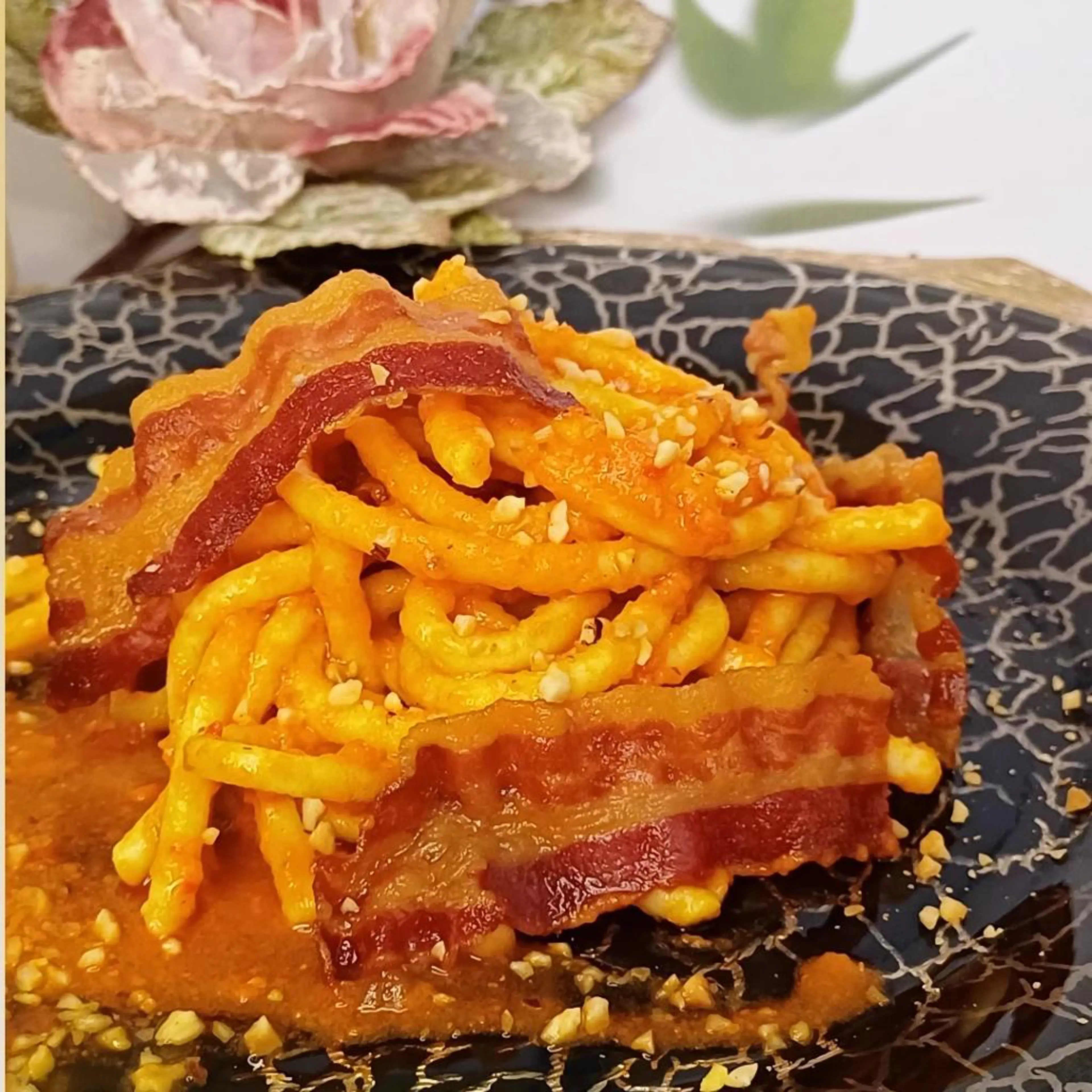Pici with peppers and bacon