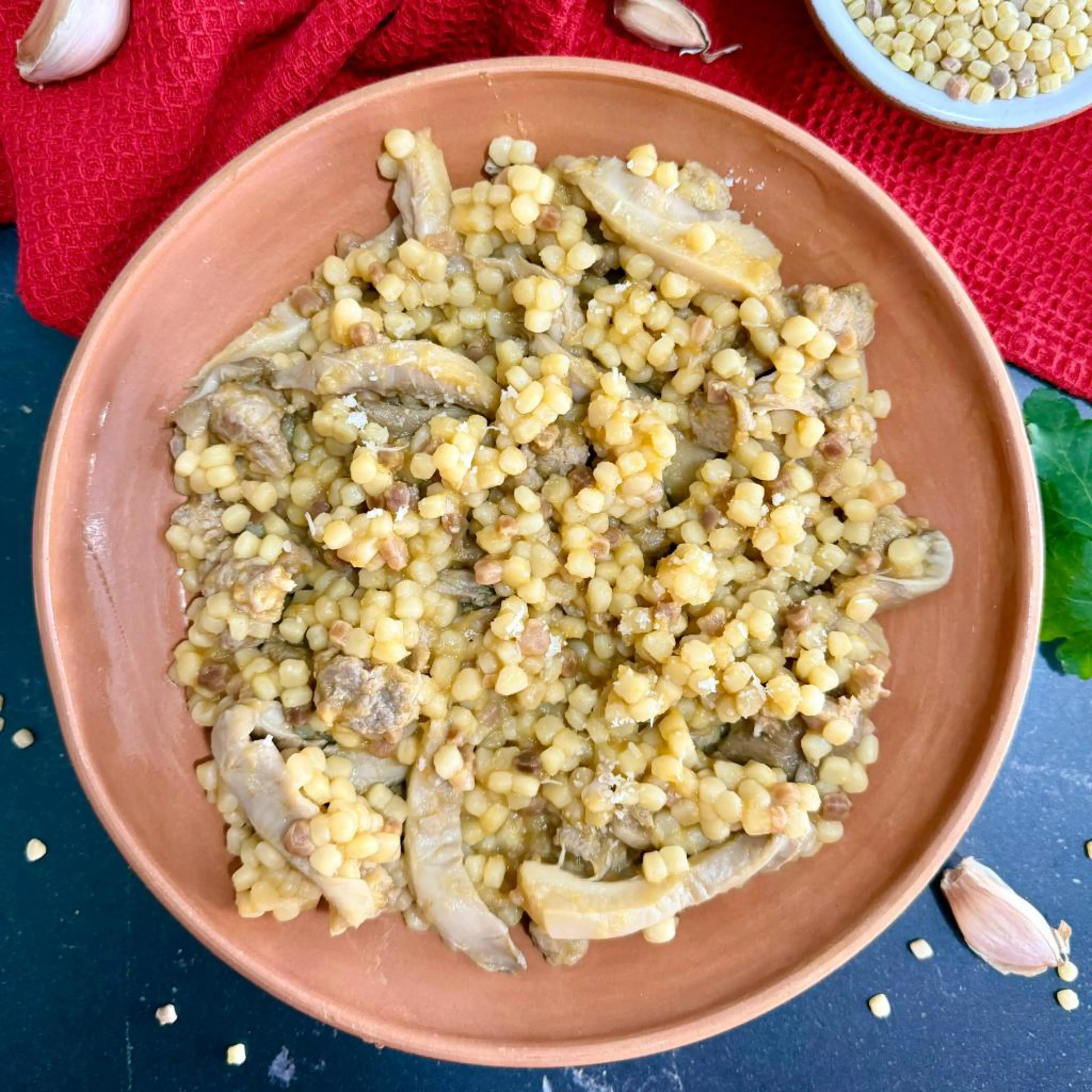 Sardinian fregola with mushrooms and sausage