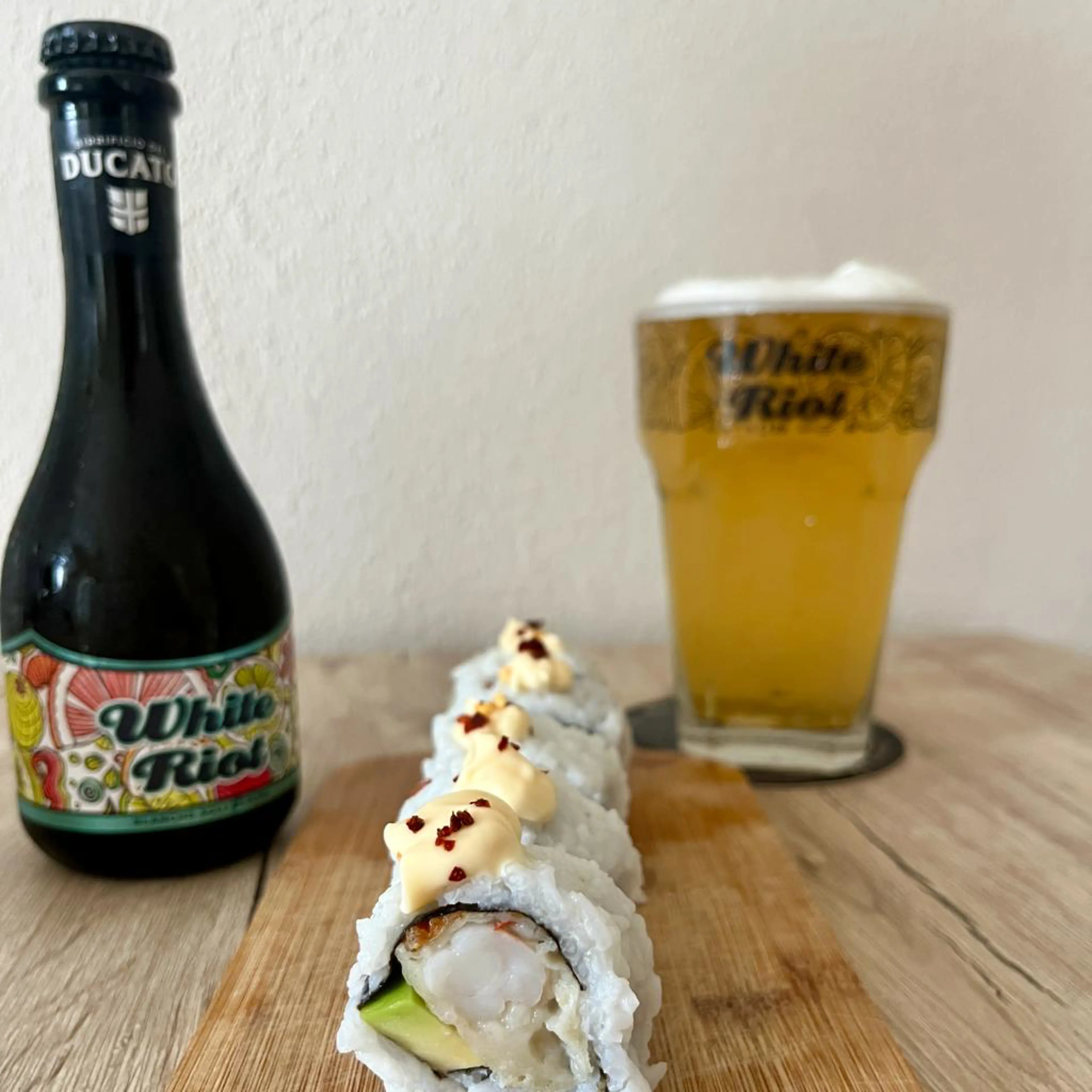 Uramaki with fried shrimp and avocado