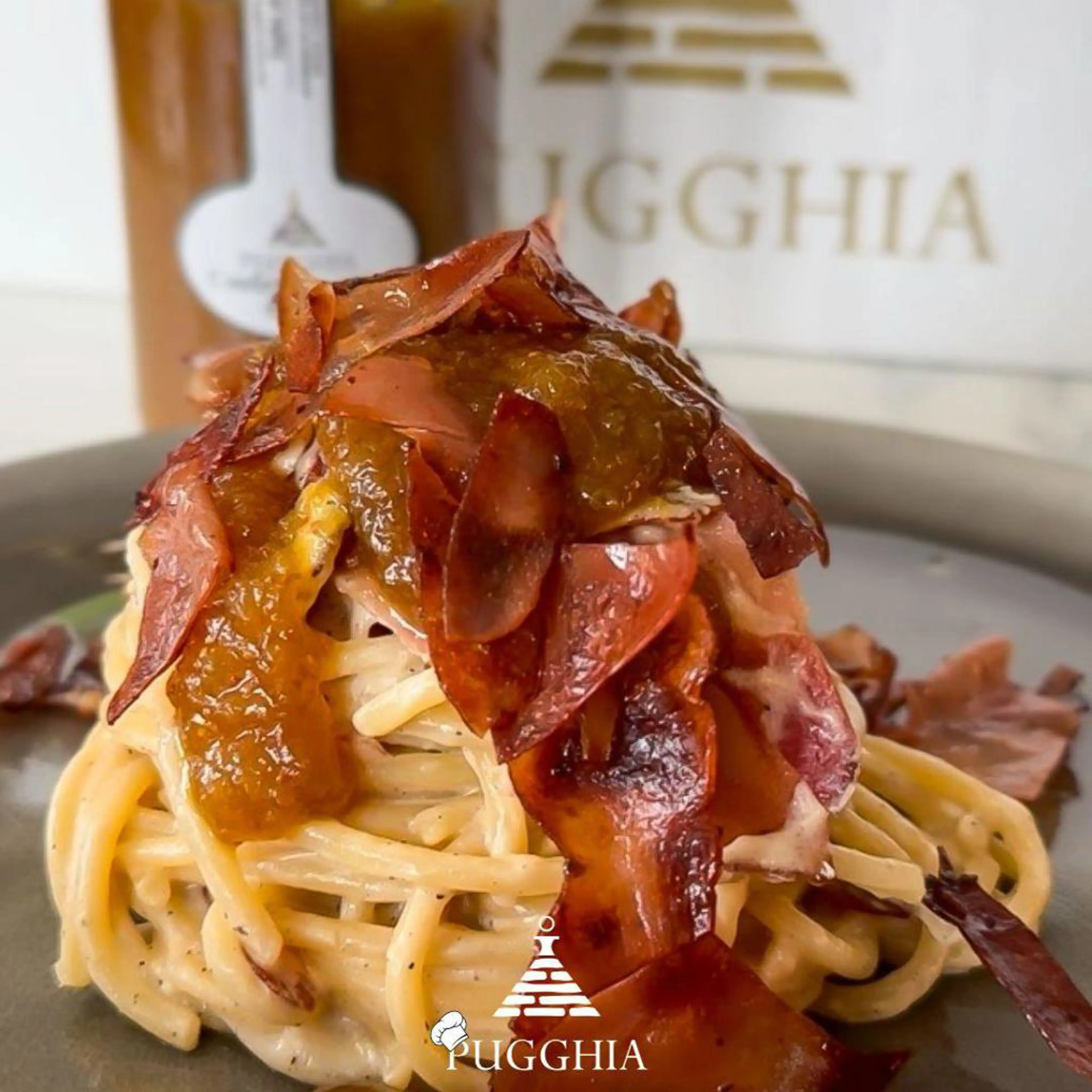 Spaghetti with feta cream, speck and fig jam