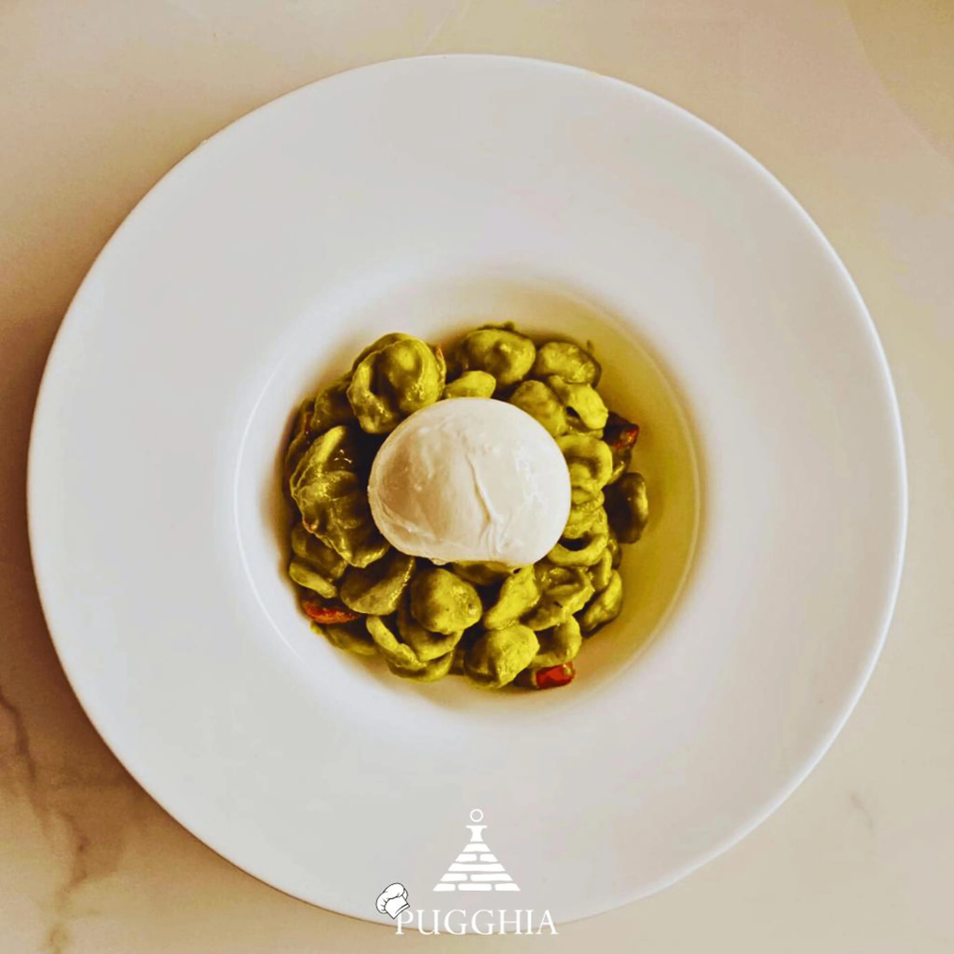 Orecchiette with turnip top cream, confit cherry tomatoes and burrata