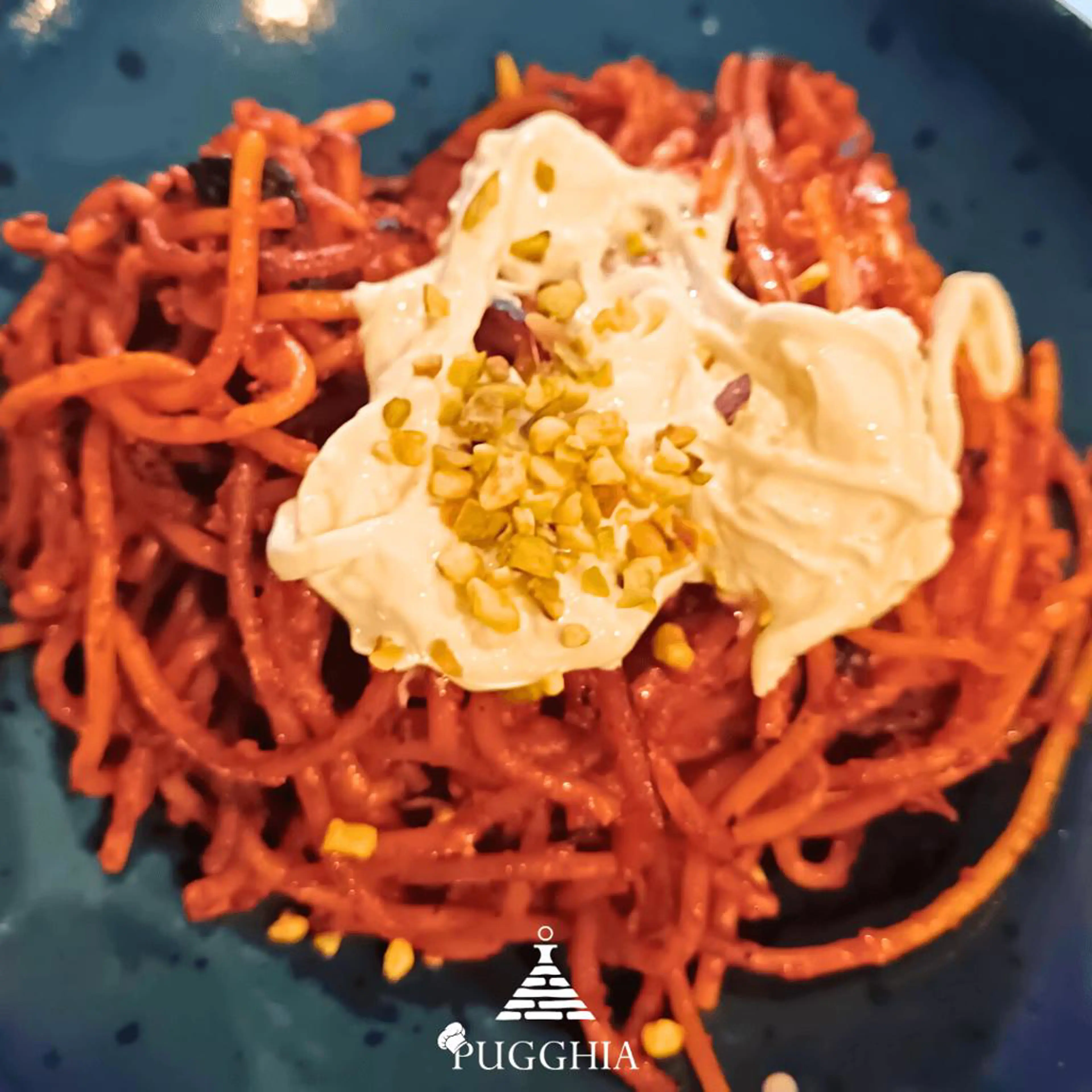 Gourmet Spaghetti all'Assassina with stracciatella and pistachio