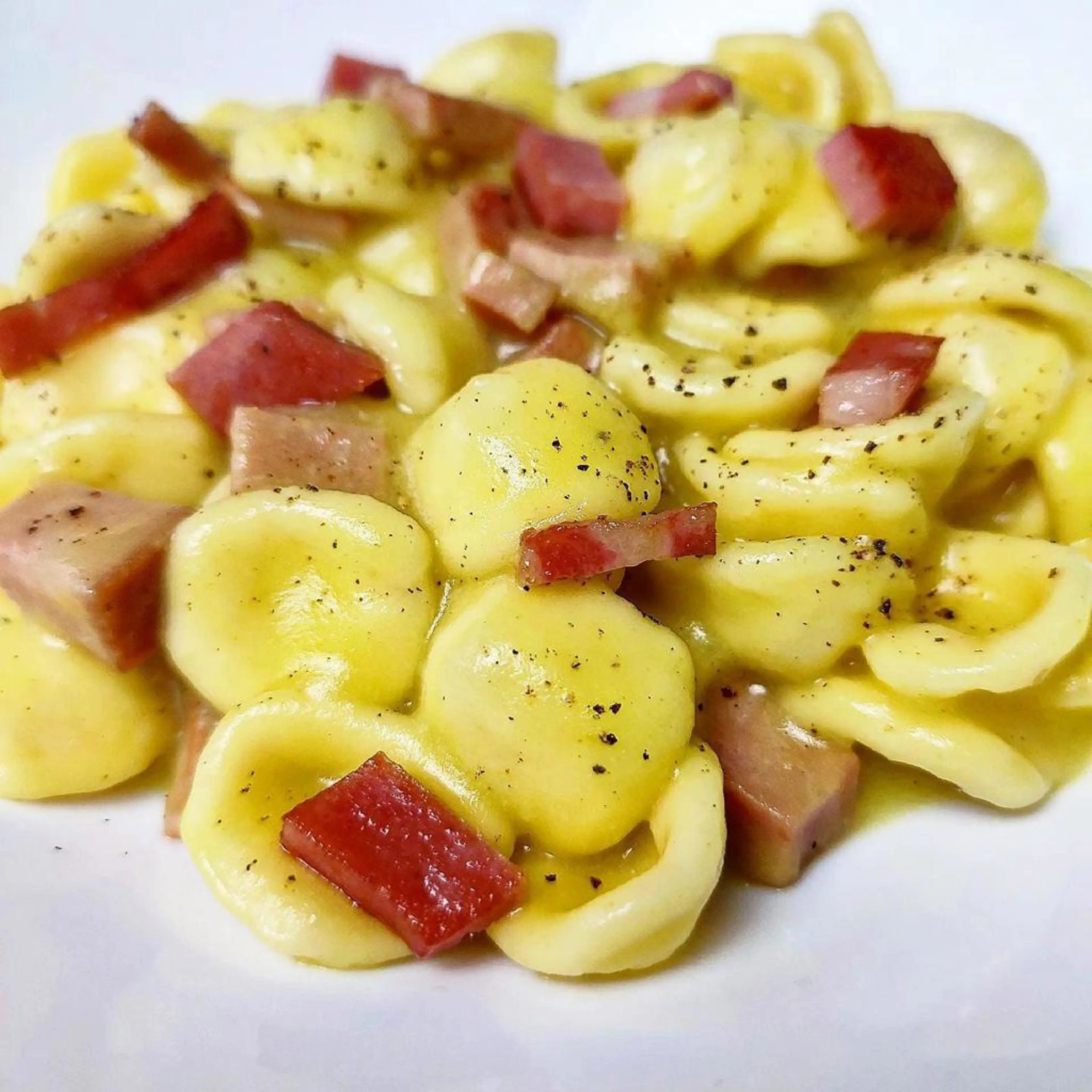 Orecchiette with potato cream and crispy mortadella