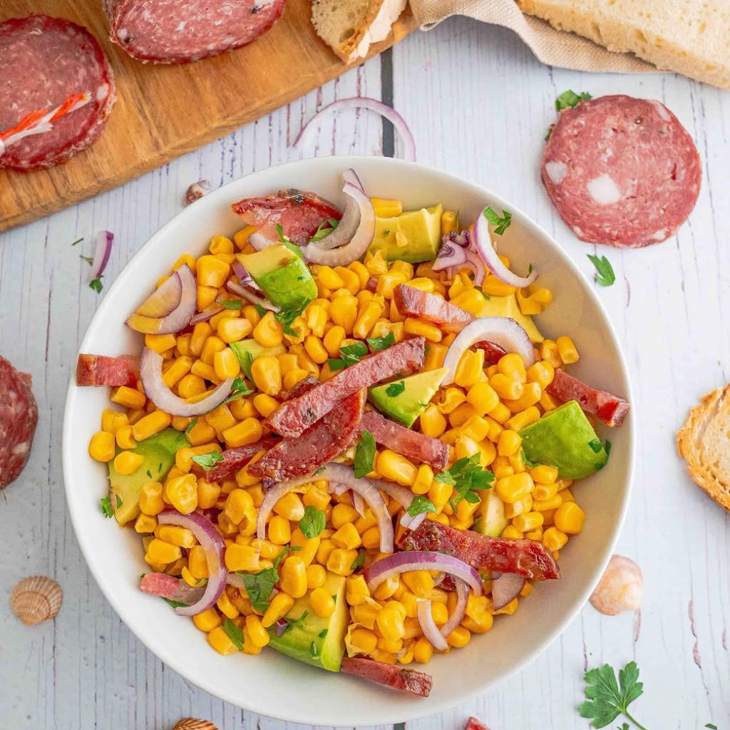 Summer salad with crispy Tuscan salami, corn and avocado