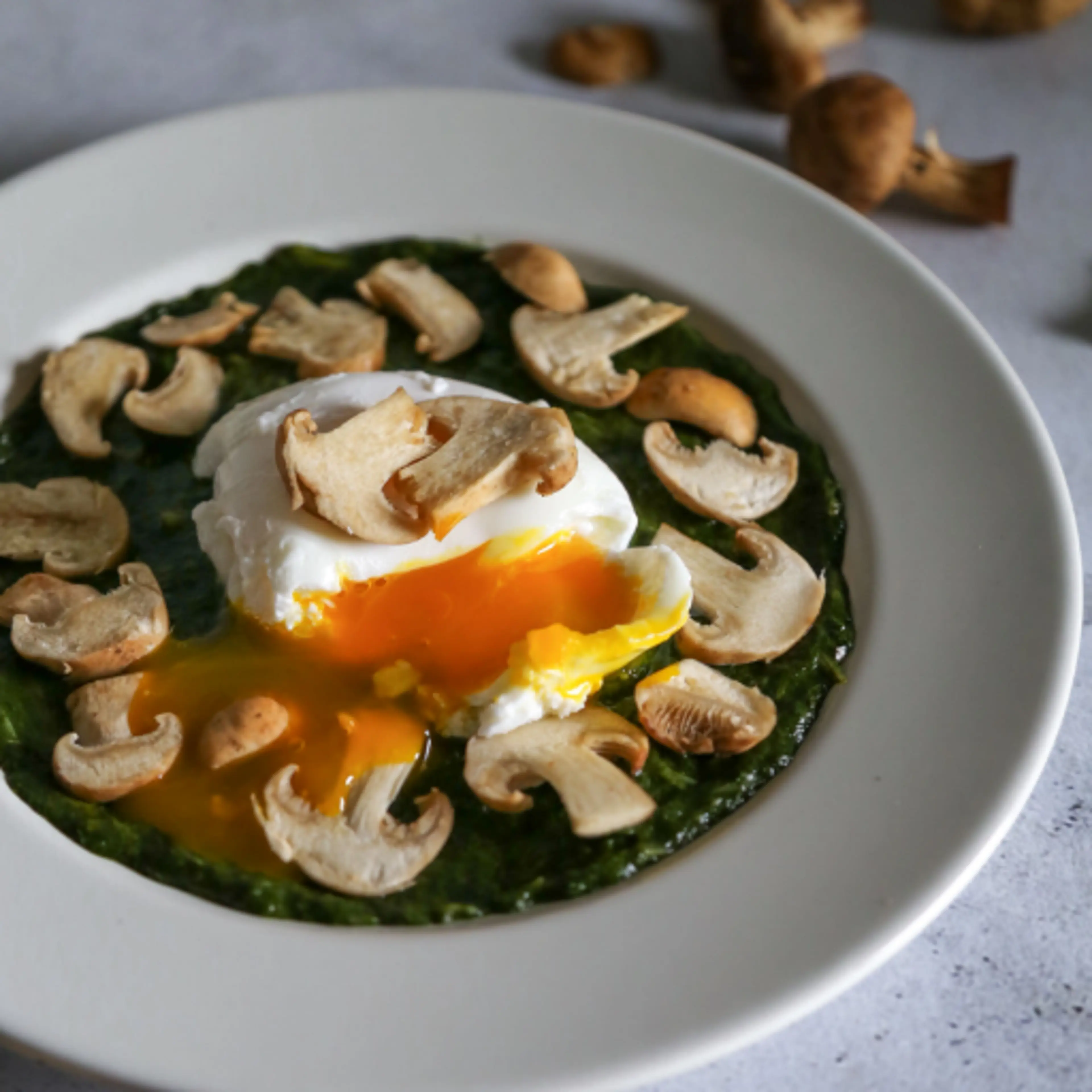 Poached egg and prugnoli mushrooms