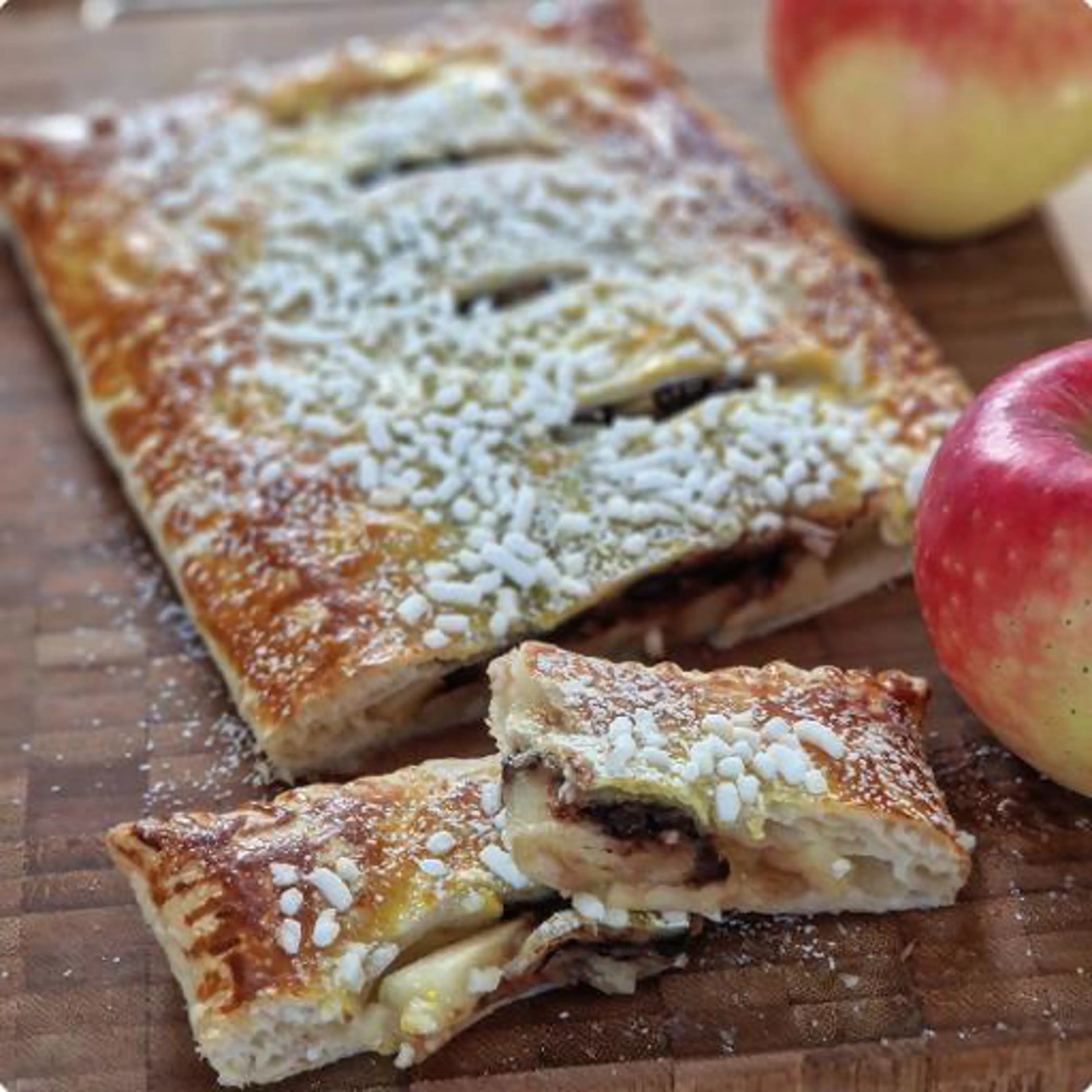 Puff pastry roll with apples and chocolate