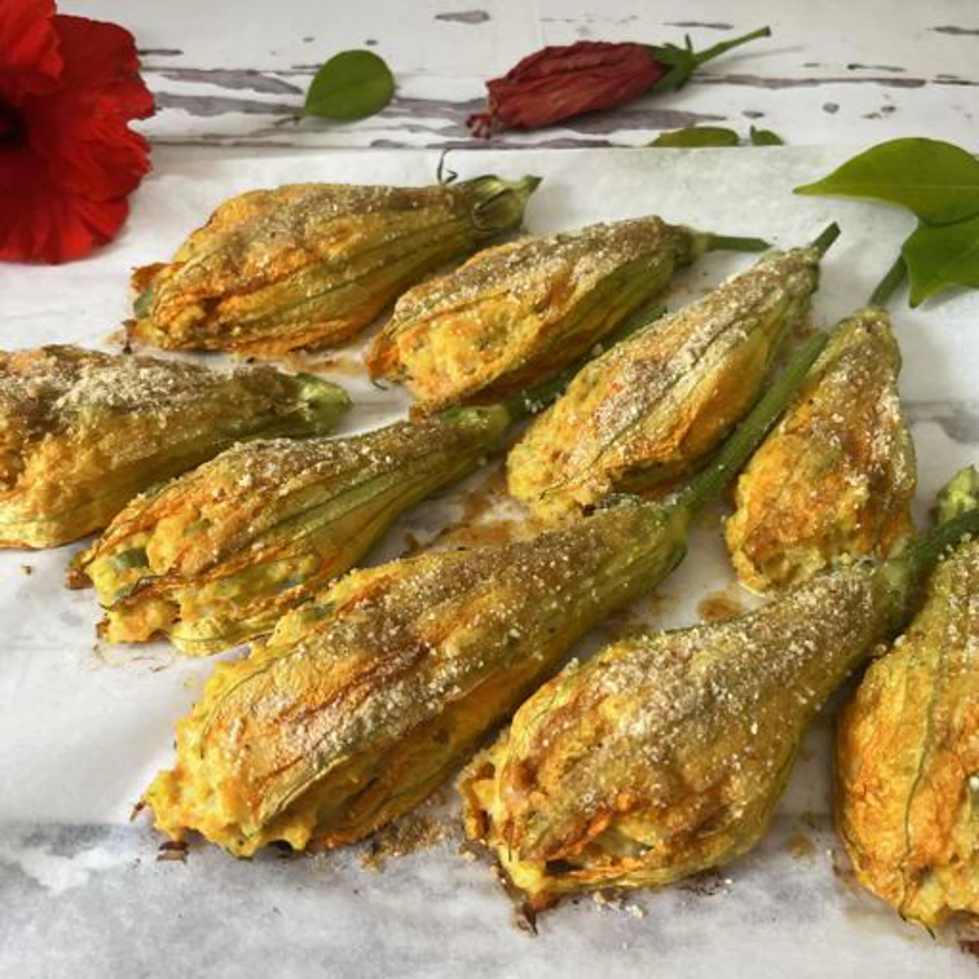 Stuffed and gratinated zucchini flowers