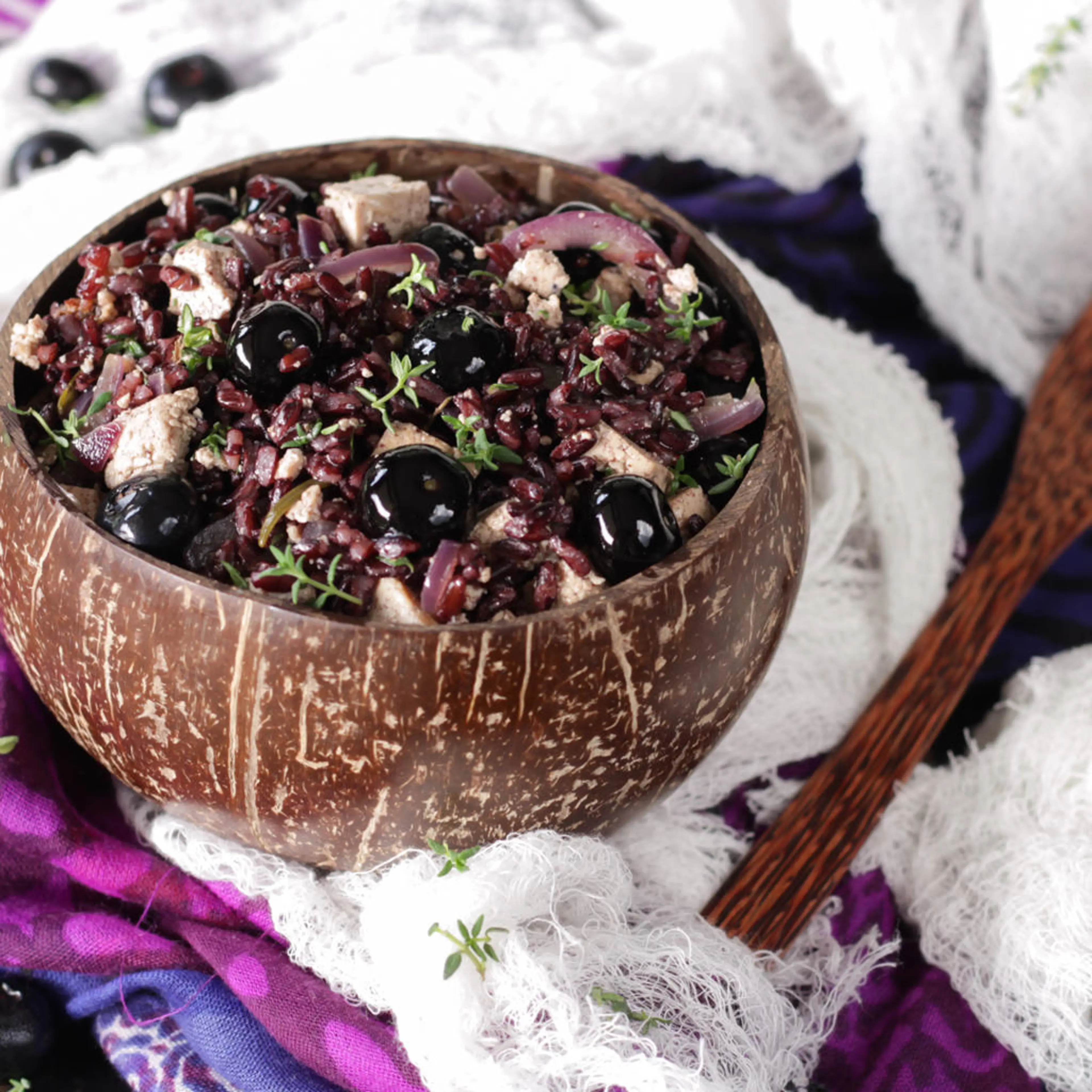 Venere rice with marinated tofu, blueberries and thyme