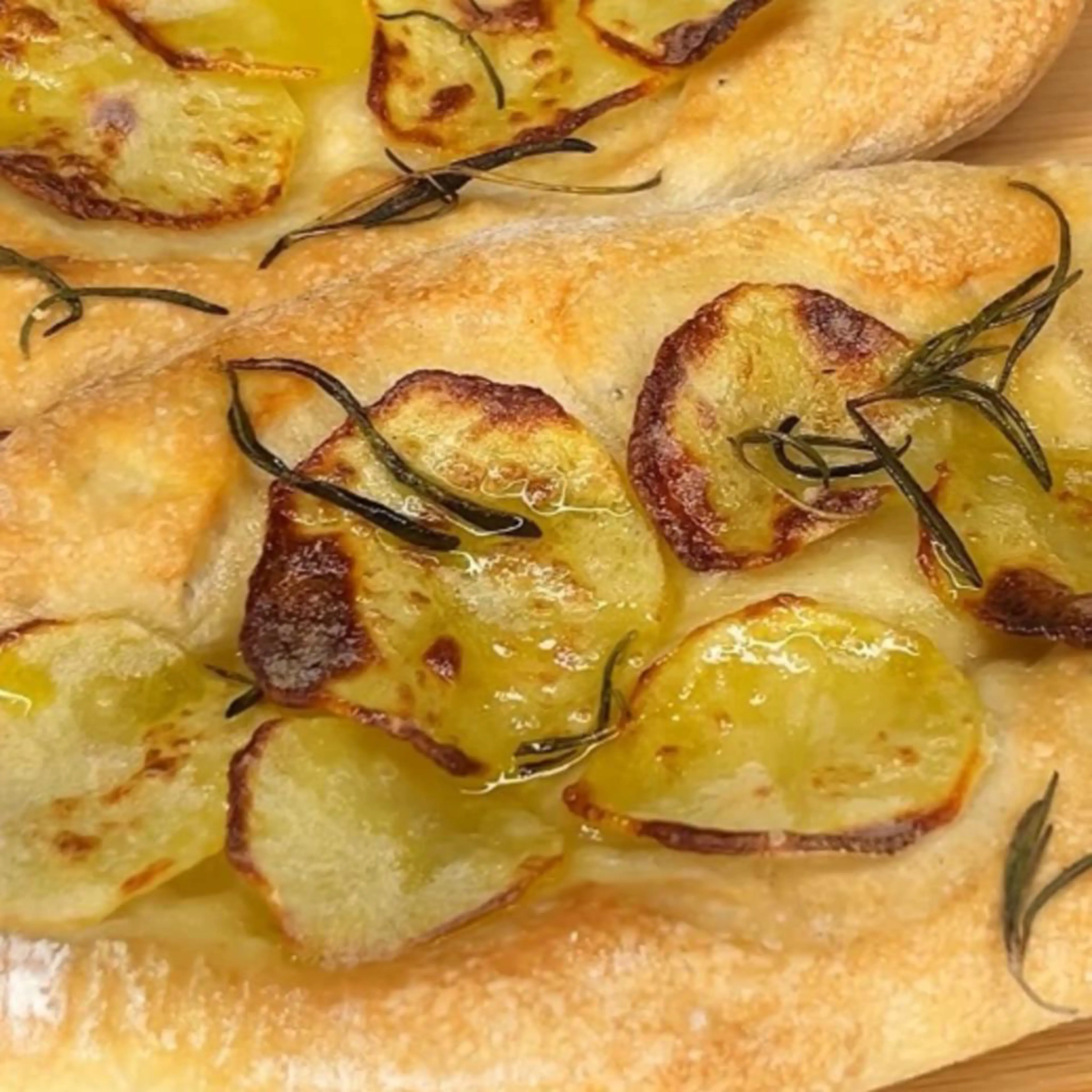 Long pizzettes with potatoes and rosemary