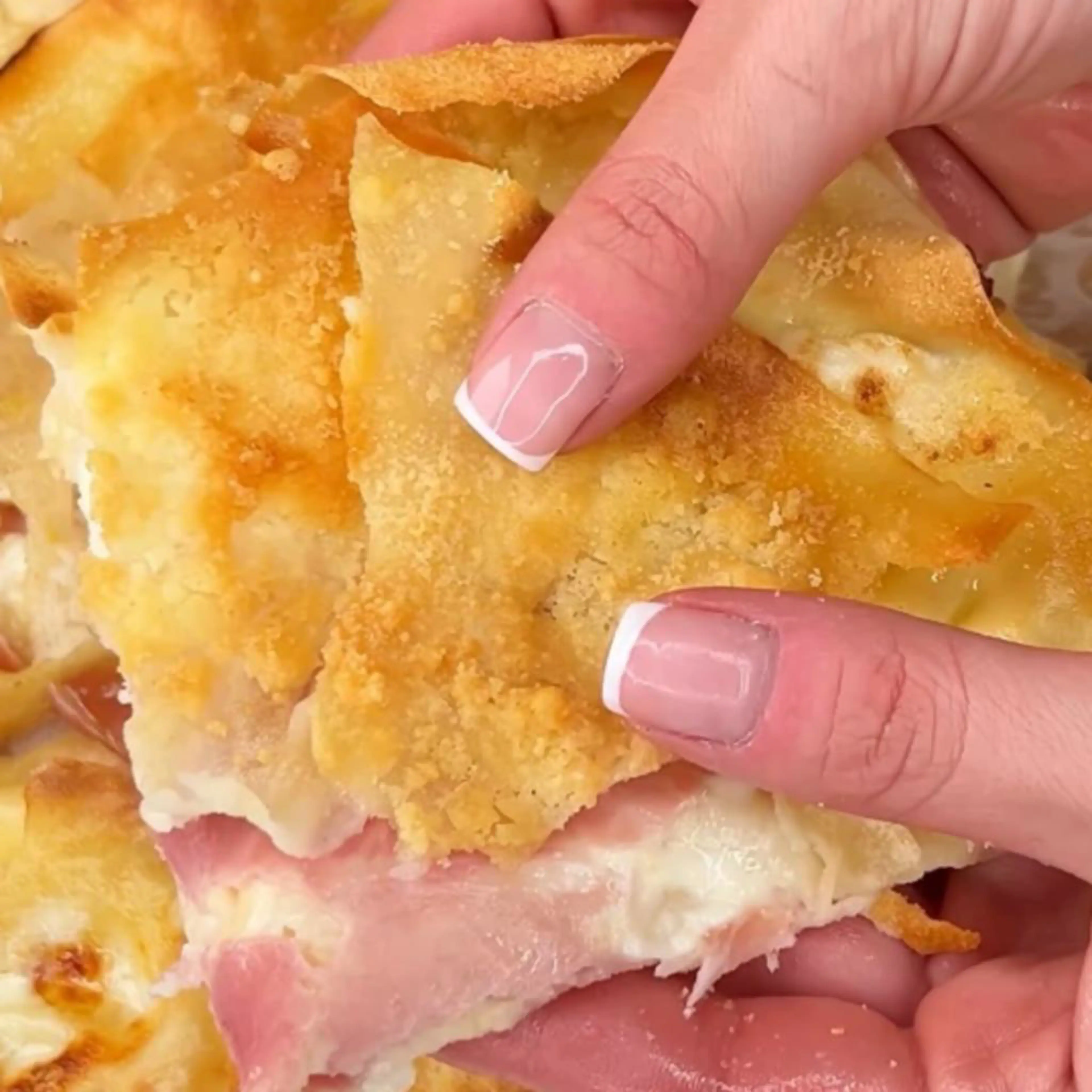 Easy and quick no-knead focaccia with stracchino and cooked ham