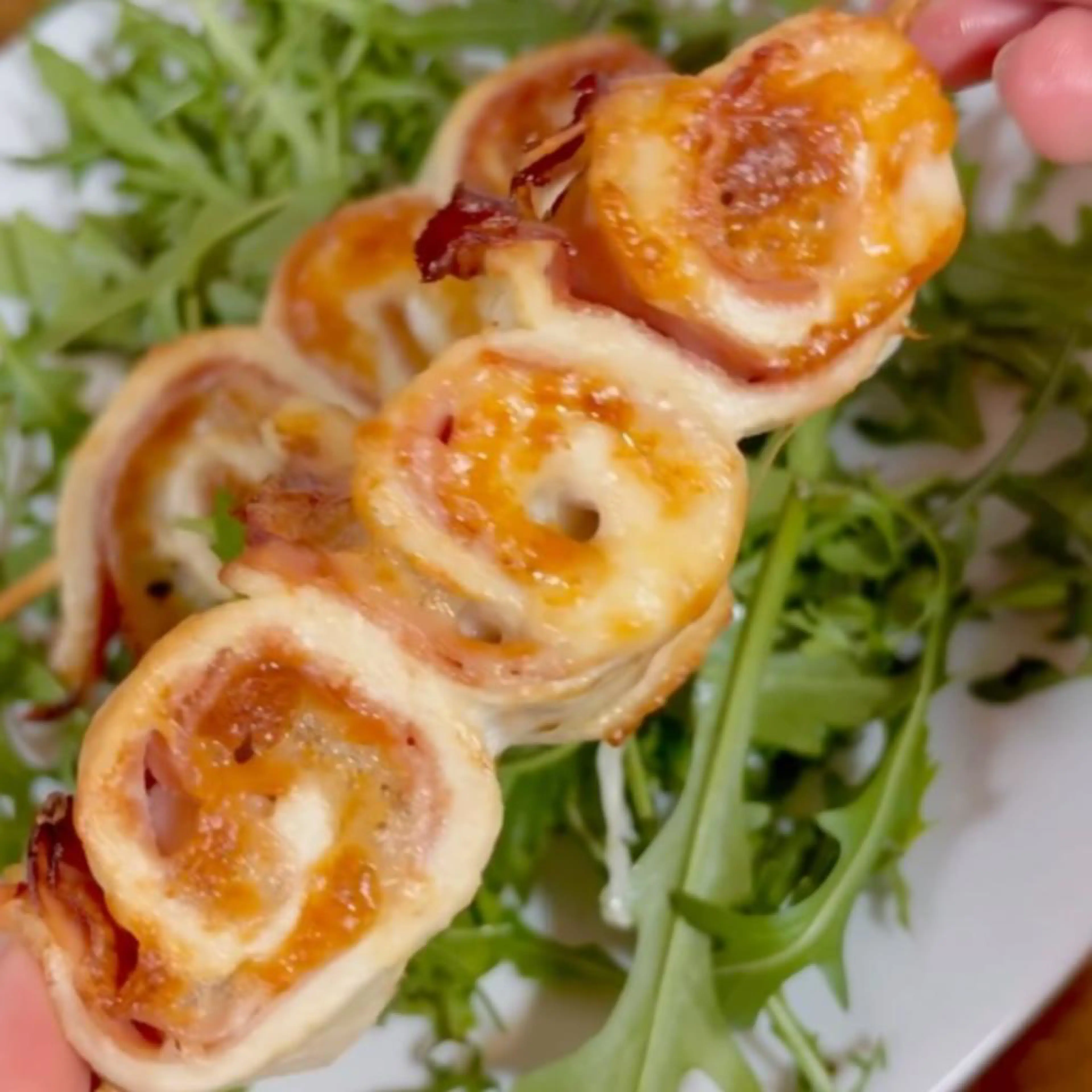 Chicken skewers with ham and scamorza cheese