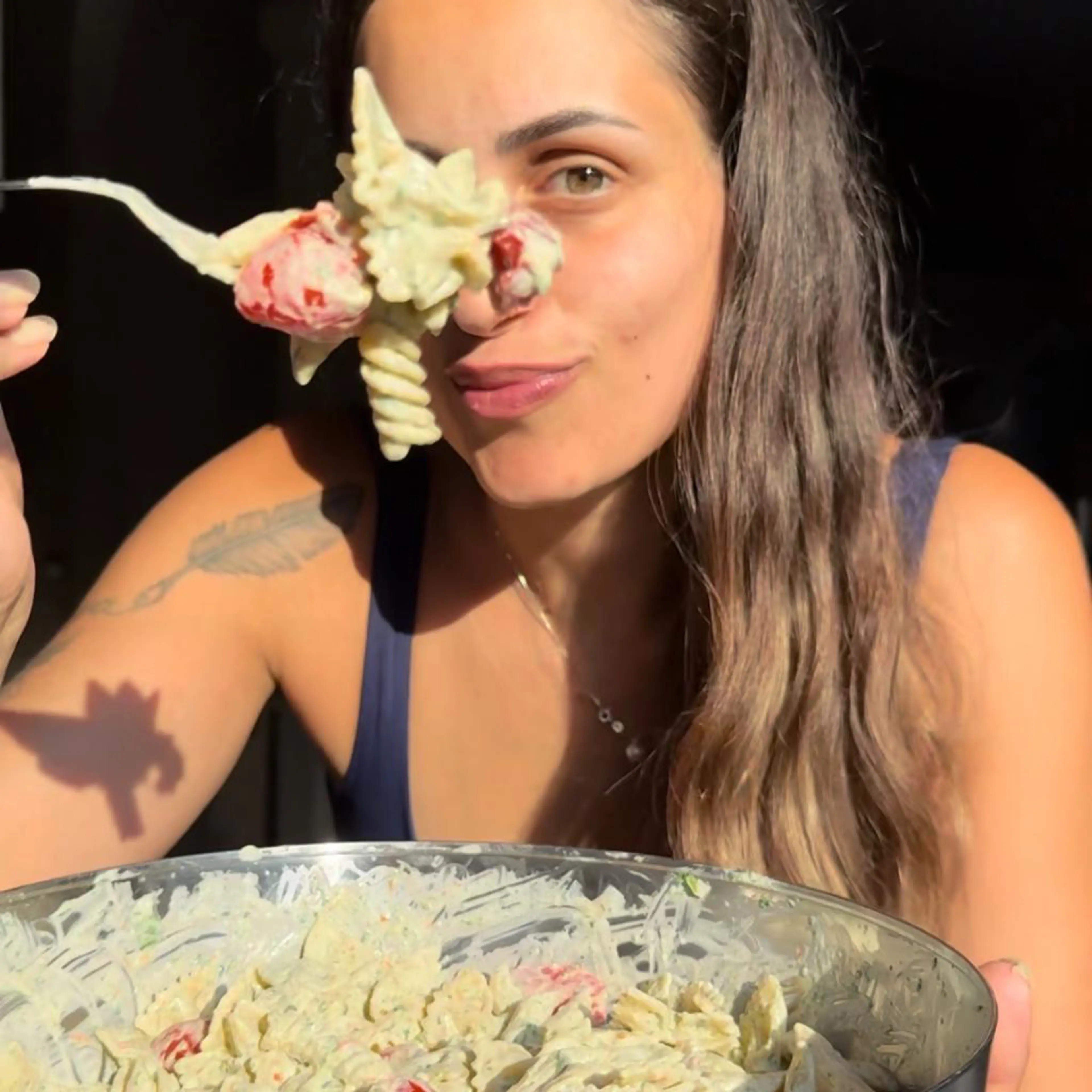 Pasta with cherry tomatoes, ricotta, arugula and olives in the air fryer